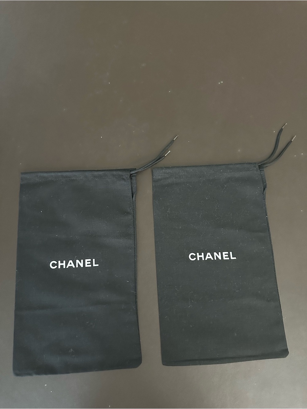 CHANEL Black and White Logo Drawstring Pouch